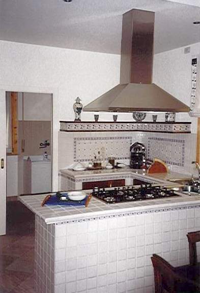 La construcción y la chimenea de la cocina - Italia Casas